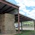 close up view of hay barn covering hay stack