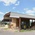 exterior of residential hay barn covering hay and farm equipment