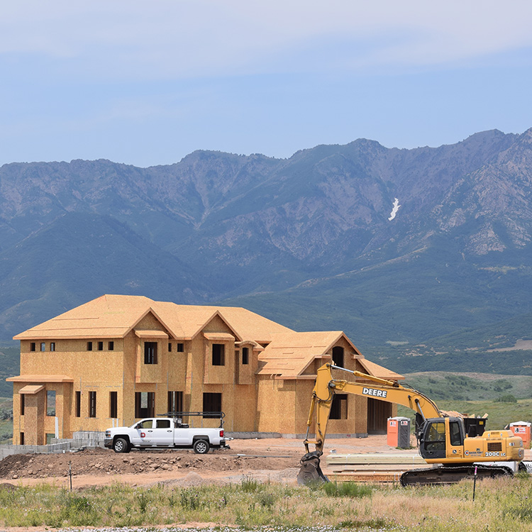 Exterior of framed custom home in Morgan, Utah