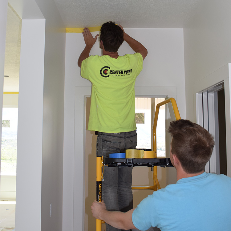 Center Point employees preparing for painting a custom home in Bountiful, Utah