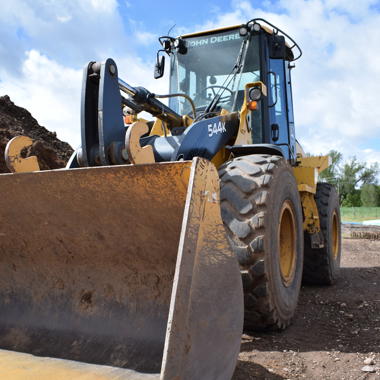 Parked loader driven by Center Point's excavation crew