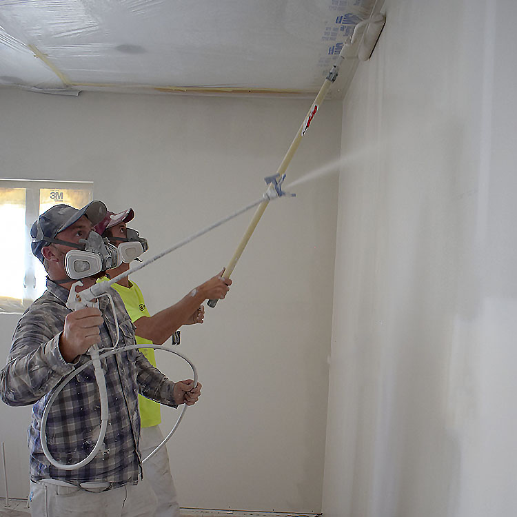 Center Point employees painting walls at custom home in northern Utah